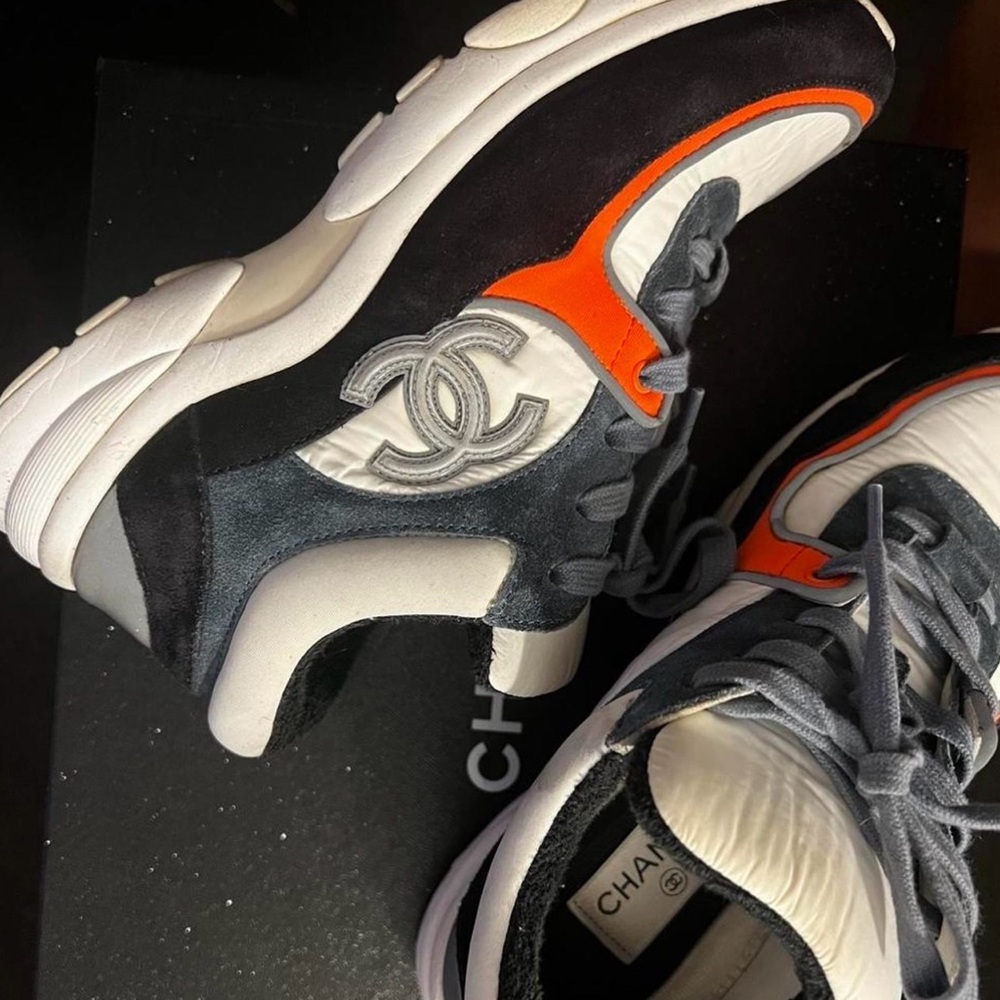 CHANEL Black, White, and Orange Athletic Shoes